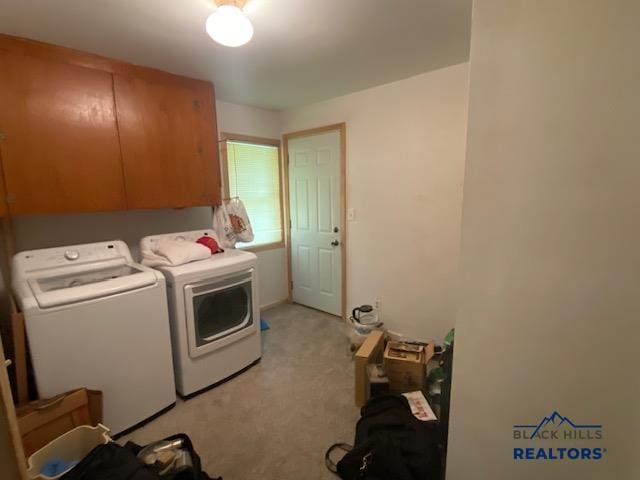 1220 Shephard St, Sturgis, SD 57785 - laundry room featuring independent washer and dryer, cabinet space, and light carpet