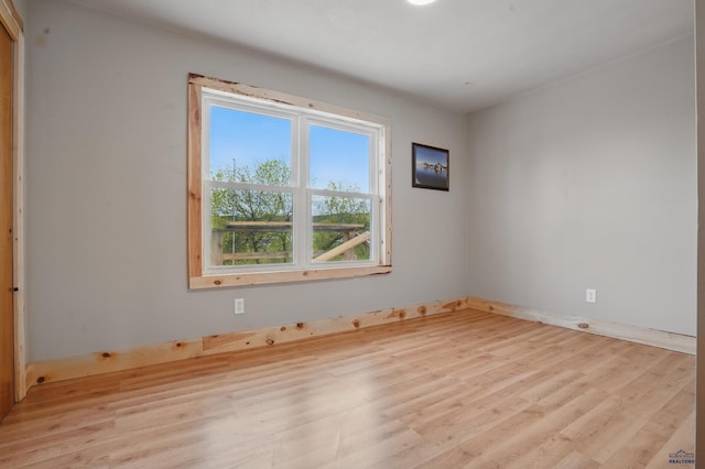385 15th St, Sturgis, SD 57785 - unfurnished room featuring wood finished floors and baseboards