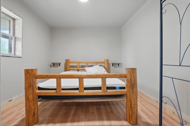 385 15th St, Sturgis, SD 57785 - bedroom featuring wood finished floors
