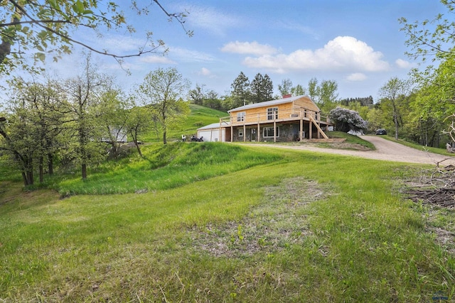 385 15th St, Sturgis, SD 57785 - view of yard with a wooden deck and driveway