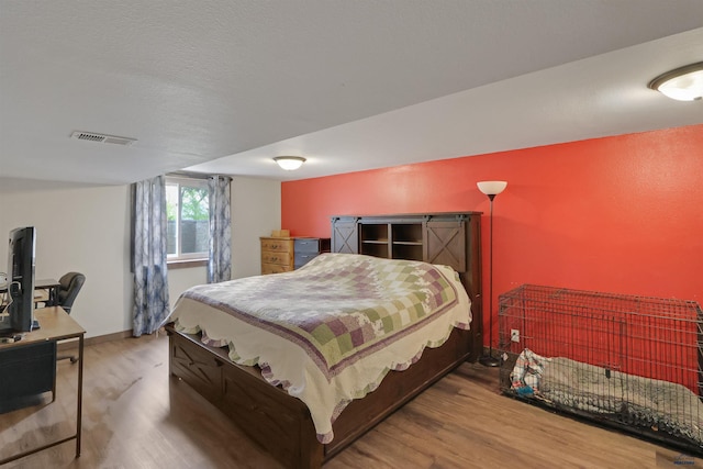 712 Stanley, Belle Fourche, SD 57717 - bedroom with wood finished floors