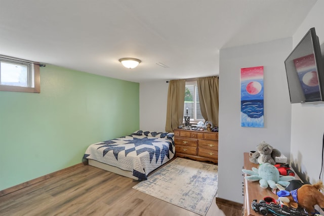 712 Stanley, Belle Fourche, SD 57717 - bedroom featuring wood finished floors