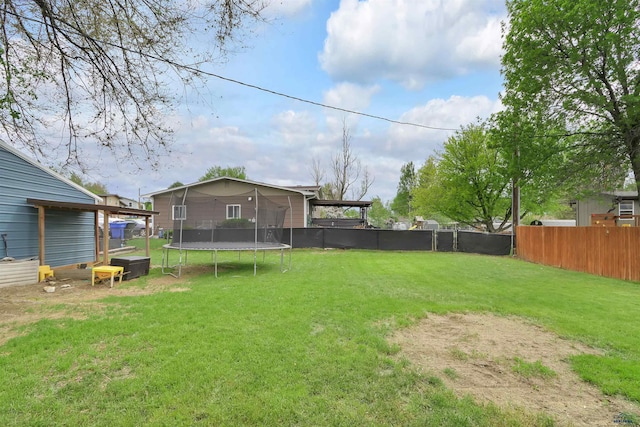 712 Stanley, Belle Fourche, SD 57717 - view of yard featuring a trampoline