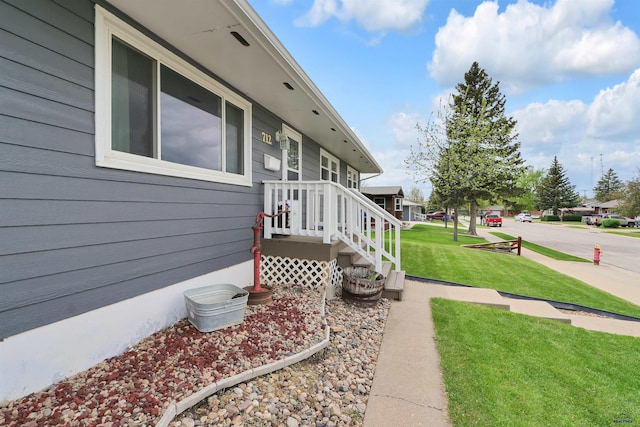 712 Stanley, Belle Fourche, SD 57717 - view of side of property with a lawn