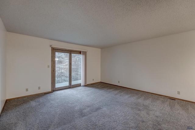 3968 Fairway Hills Dr, Rapid City, SD 57702 - unfurnished room featuring carpet floors, a textured ceiling, and baseboards