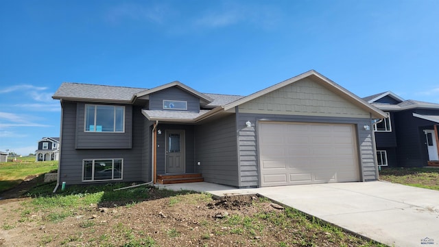 453 Yelner Dr Lot 14Blk 5, Box Elder, SD 57719 - view of front of home with a garage and driveway