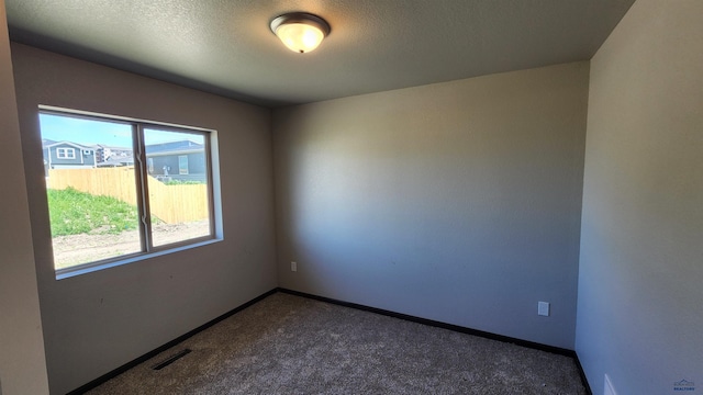 453 Yelner Dr Lot 14Blk 5, Box Elder, SD 57719 - carpeted empty room featuring baseboards