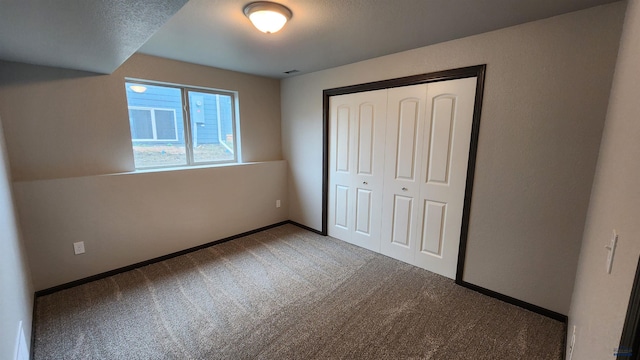 453 Yelner Dr Lot 14Blk 5, Box Elder, SD 57719 - unfurnished bedroom with carpet floors, a closet, and baseboards