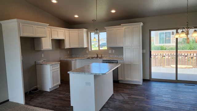 453 Yelner Dr Lot 14Blk 5, Box Elder, SD 57719 - kitchen featuring a sink, a kitchen island, white cabinets, a chandelier, and vaulted ceiling