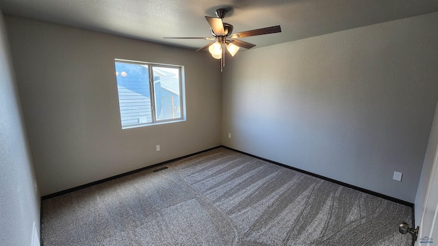453 Yelner Dr Lot 14Blk 5, Box Elder, SD 57719 - spare room featuring carpet flooring, ceiling fan, and baseboards