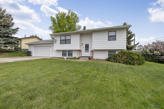 6312 Fairway Dr, Black Hawk, SD 57718 - raised ranch with a garage, concrete driveway, and a front lawn