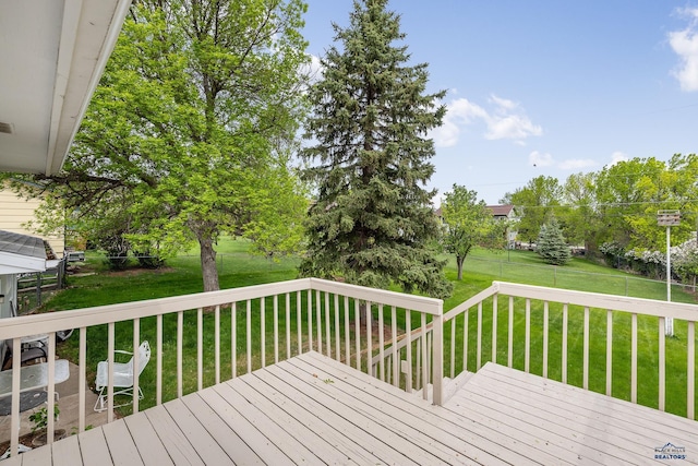 6312 Fairway Dr, Black Hawk, SD 57718 - wooden deck featuring a lawn