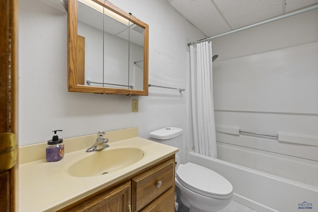 6312 Fairway Dr, Black Hawk, SD 57718 - full bathroom featuring a drop ceiling, toilet, shower / tub combo with curtain, and vanity