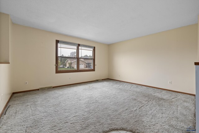 6312 Fairway Dr, Black Hawk, SD 57718 - empty room with carpet flooring and baseboards