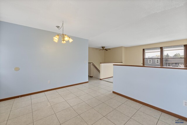 6312 Fairway Dr, Black Hawk, SD 57718 - spare room with baseboards and a chandelier