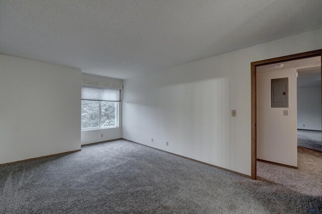 3965 Fairway Hills Dr, Rapid City, SD 57702 - carpeted spare room featuring electric panel and baseboards