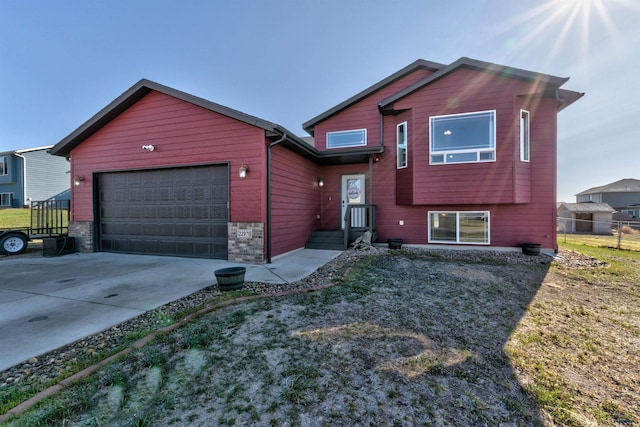 22970 Candlelight Dr, Rapid City, SD 57703 - split level home with fence, an attached garage, and driveway