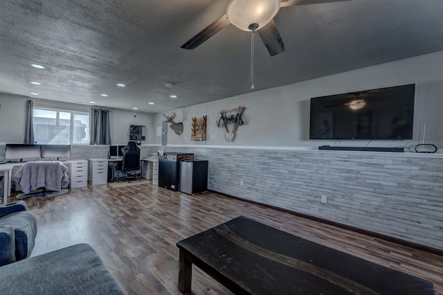 22970 Candlelight Dr, Rapid City, SD 57703 - living room with an office area, wood finished floors, recessed lighting, a wainscoted wall, and a ceiling fan