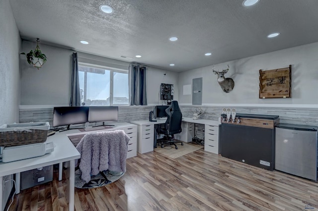 22970 Candlelight Dr, Rapid City, SD 57703 - office with a textured ceiling, recessed lighting, and light wood-style floors