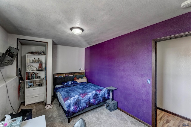22970 Candlelight Dr, Rapid City, SD 57703 - carpeted bedroom featuring a textured ceiling and a textured wall