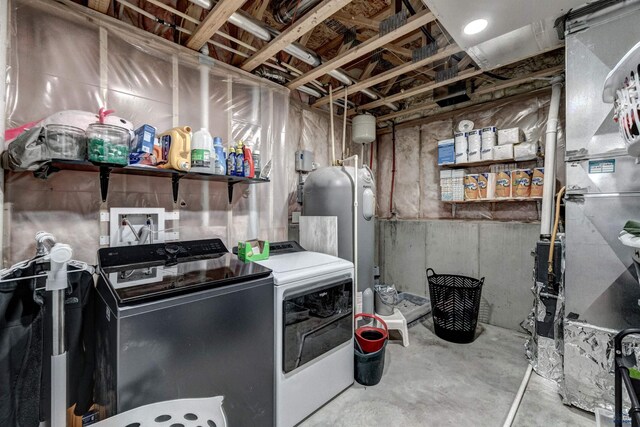 22970 Candlelight Dr, Rapid City, SD 57703 - laundry room featuring washer and dryer and heating unit