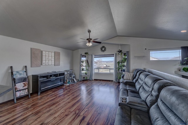 22970 Candlelight Dr, Rapid City, SD 57703 - living area with wood finished floors, lofted ceiling, a ceiling fan, a textured ceiling, and baseboards