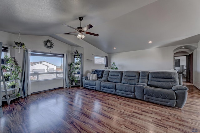 22970 Candlelight Dr, Rapid City, SD 57703 - living area featuring wood finished floors, a ceiling fan, vaulted ceiling, arched walkways, and recessed lighting