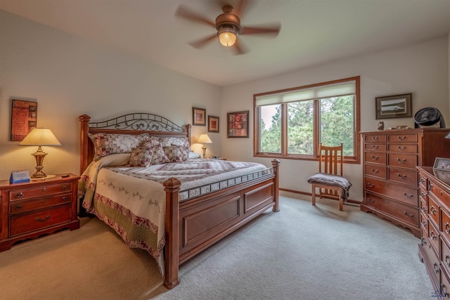 6516 Muirfield Dr, Rapid City, SD 57702 - bedroom featuring light colored carpet, baseboards, and ceiling fan