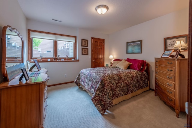 6516 Muirfield Dr, Rapid City, SD 57702 - bedroom featuring light carpet and baseboards