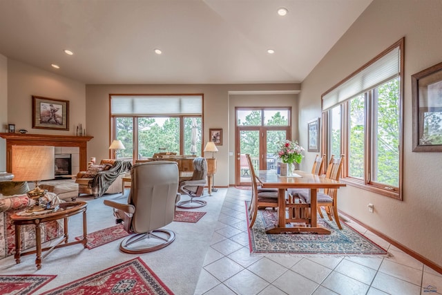 6516 Muirfield Dr, Rapid City, SD 57702 - dining area with healthy amount of natural light, recessed lighting, baseboards, a fireplace, and lofted ceiling