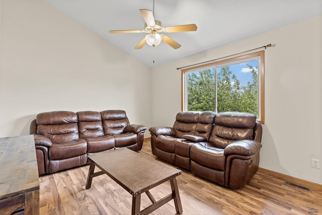 5436 Weathervane Ln, Rapid City, SD 57703 - living room featuring light wood-style floors, ceiling fan, and vaulted ceiling