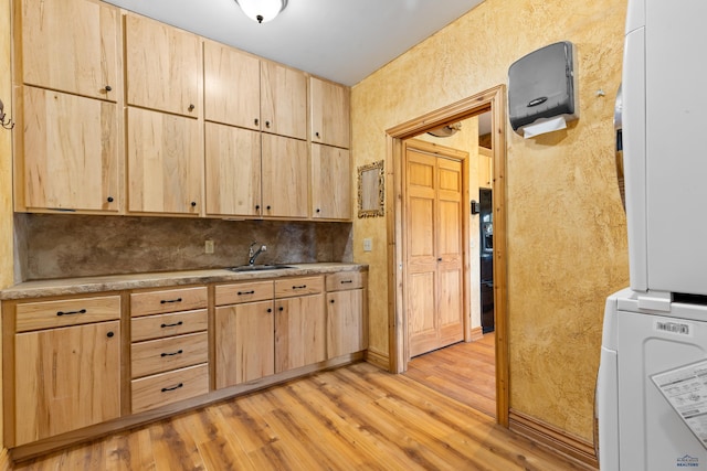 22600 Jenny Gulch Rd Unit 22600/22636Jenny, Gulch Rd, Rapid City, SD 57702 - kitchen with light brown cabinetry, light wood-type flooring, a sink, light countertops, and a textured wall