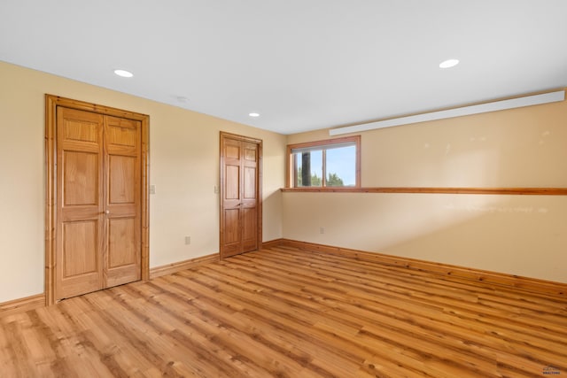22600 Jenny Gulch Rd Unit 22600/22636Jenny, Gulch Rd, Rapid City, SD 57702 - unfurnished bedroom with light wood-style floors, baseboards, and recessed lighting