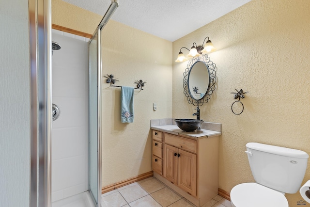 22600 Jenny Gulch Rd Unit 22600/22636Jenny, Gulch Rd, Rapid City, SD 57702 - full bathroom featuring a stall shower, tile patterned floors, toilet, and vanity