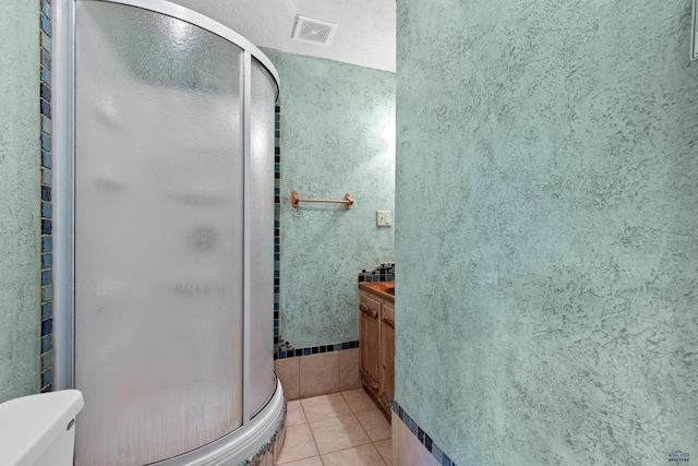 22600 Jenny Gulch Rd Unit 22600/22636Jenny, Gulch Rd, Rapid City, SD 57702 - full bathroom with tile patterned floors, a shower stall, vanity, and toilet