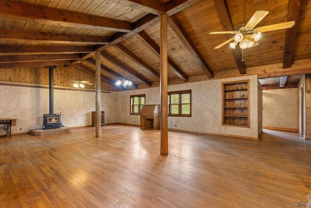 22600 Jenny Gulch Rd Unit 22600/22636Jenny, Gulch Rd, Rapid City, SD 57702 - unfurnished living room with a wood stove, wooden ceiling, wood finished floors, and a ceiling fan