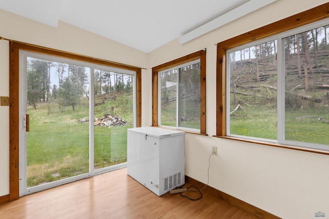 22600 Jenny Gulch Rd Unit 22600/22636Jenny, Gulch Rd, Rapid City, SD 57702 - unfurnished sunroom featuring wood finished floors and baseboards