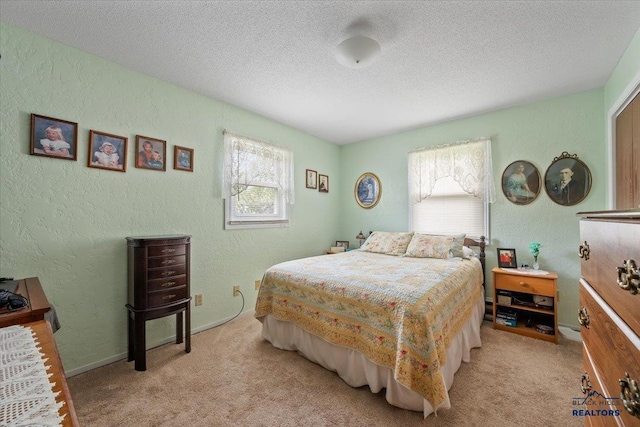 720 S 32nd, Spearfish, SD 57783 - bedroom with a textured wall, carpet, a textured ceiling, and baseboards