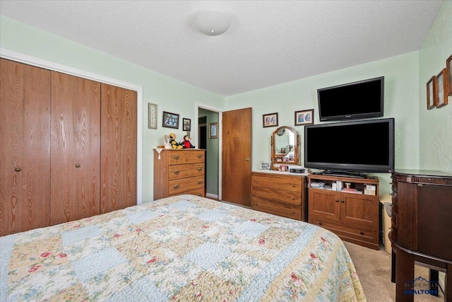 720 S 32nd, Spearfish, SD 57783 - carpeted bedroom with a closet and a textured ceiling