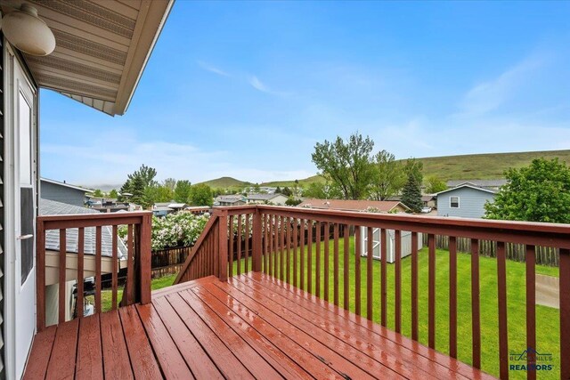 720 S 32nd, Spearfish, SD 57783 - deck featuring a yard and a mountain view