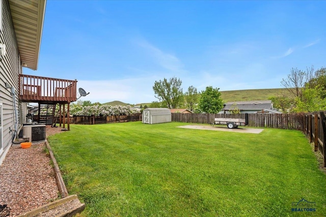 720 S 32nd, Spearfish, SD 57783 - view of yard with a deck, stairs, central AC unit, and a patio area