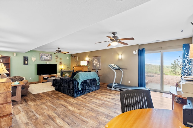 22841 Gateway Dr, Box Elder, SD 57719 - living room with a ceiling fan and wood finished floors
