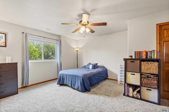 22841 Gateway Dr, Box Elder, SD 57719 - bedroom featuring carpet floors, baseboards, and ceiling fan