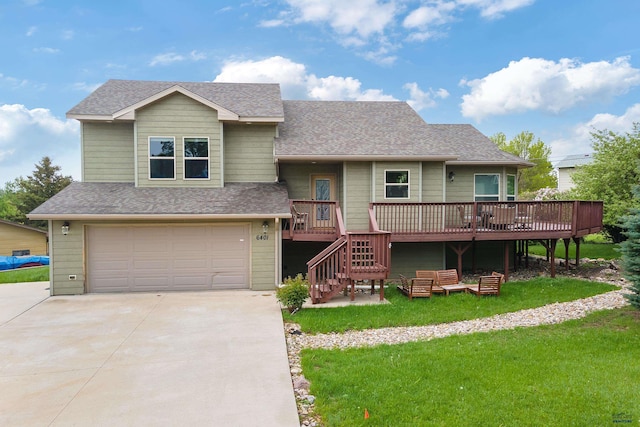 6401 Mountain Meadow Rd, Black Hawk, SD 57718 - view of front of property with concrete driveway, a deck, an attached garage, and a shingled roof
