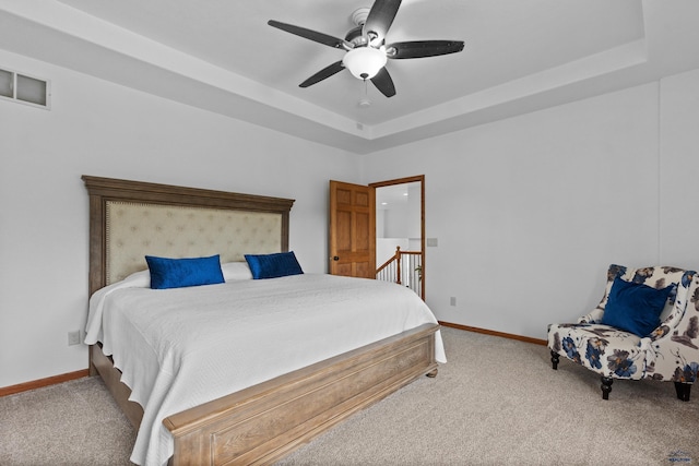 6401 Mountain Meadow Rd, Black Hawk, SD 57718 - carpeted bedroom featuring baseboards, a tray ceiling, and ceiling fan