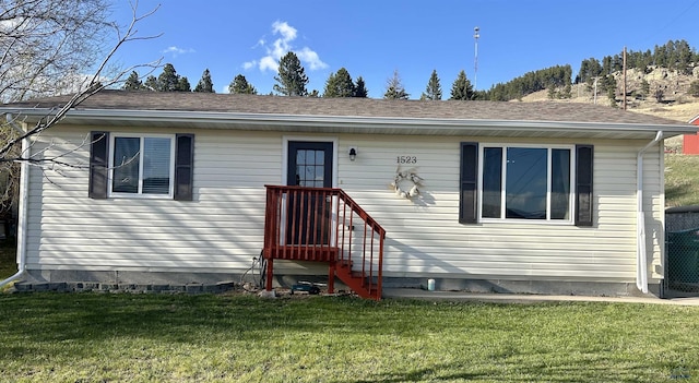 1523 Hope St, Sturgis, SD 57785 - view of front of property featuring a front lawn
