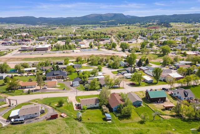1523 Hope St, Sturgis, SD 57785 - aerial view of residential area with mountains