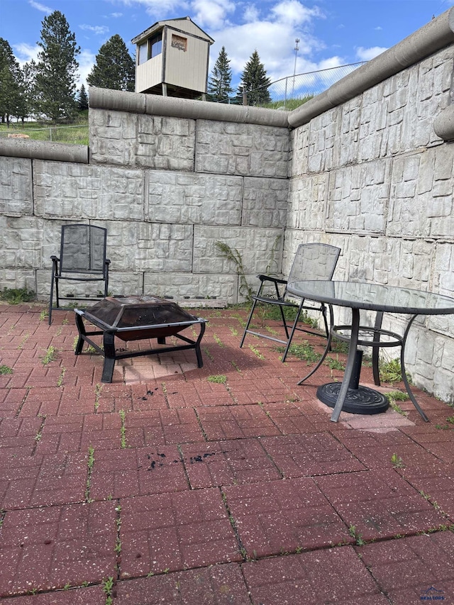 1523 Hope St, Sturgis, SD 57785 - view of patio / terrace with an outdoor fire pit and outdoor dining space