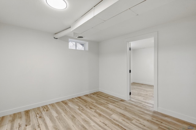 726 Willsie Ave, Rapid City, SD 57701 - below grade area with wood finished floors and baseboards