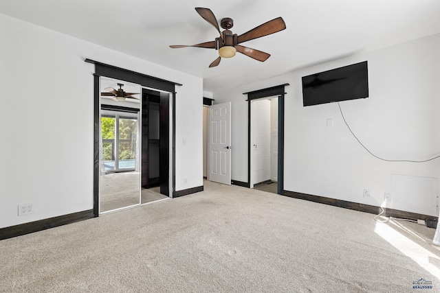1215 Range View Cir, Rapid City, SD 57701 - unfurnished bedroom featuring baseboards, access to outside, carpet, and a ceiling fan